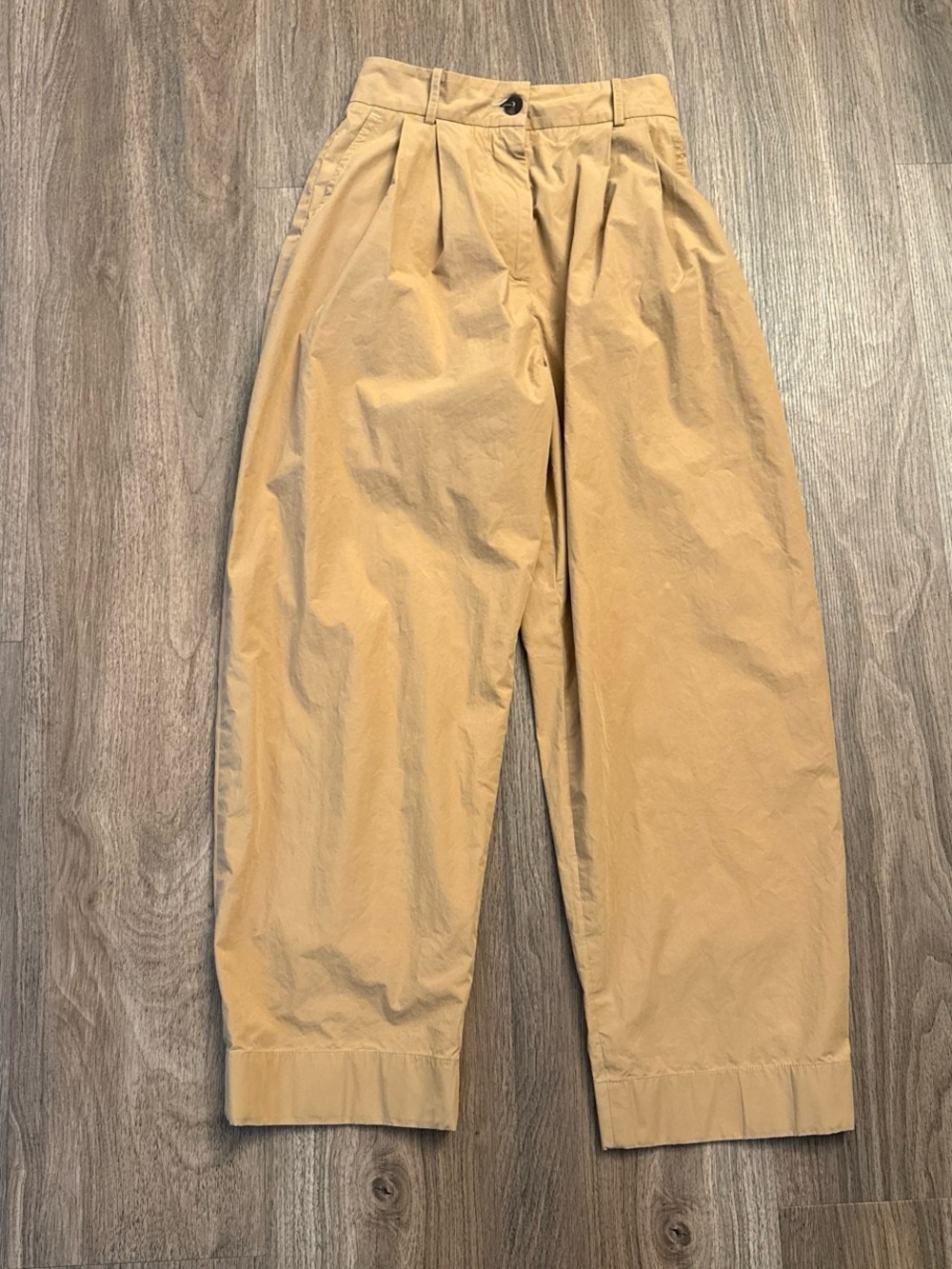 Studio Nicholson high-waisted wide-leg barrel  pants with relaxed fit. $600 MSRP